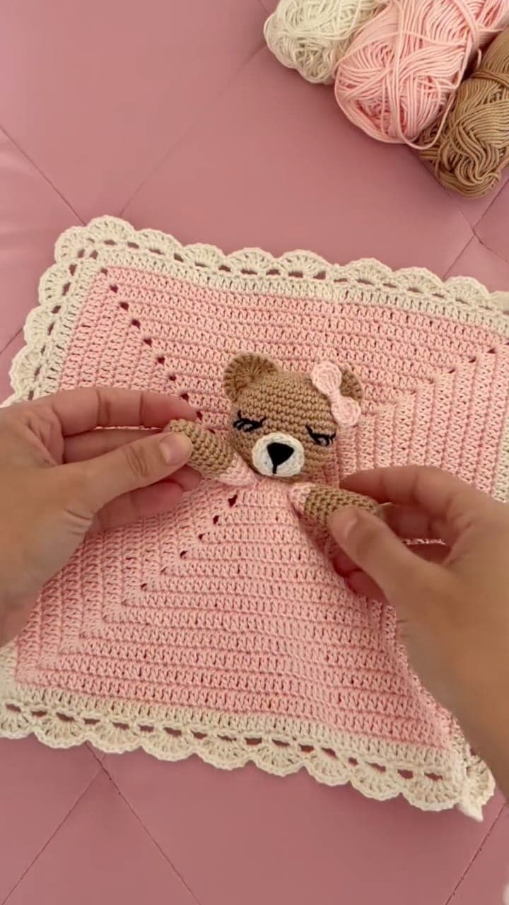 Pink crochet lovey with a teddy and a scalloped border